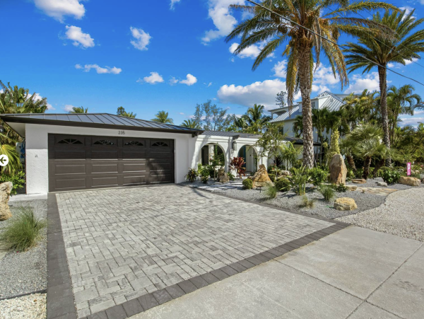 Anna Maria Island Vacation Rental - Luxury Canal Front Home with Pool & Dock